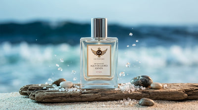 Marine fragrance bottle on coastal rocks with ocean waves in background
