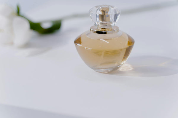 CA Perfume fragrance bottle with soft natural light representing the brand story